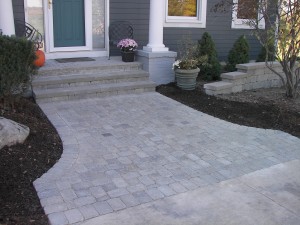 PRECAST BLOCK STEPS WITH TUMBLED BRICK PAVER WALK